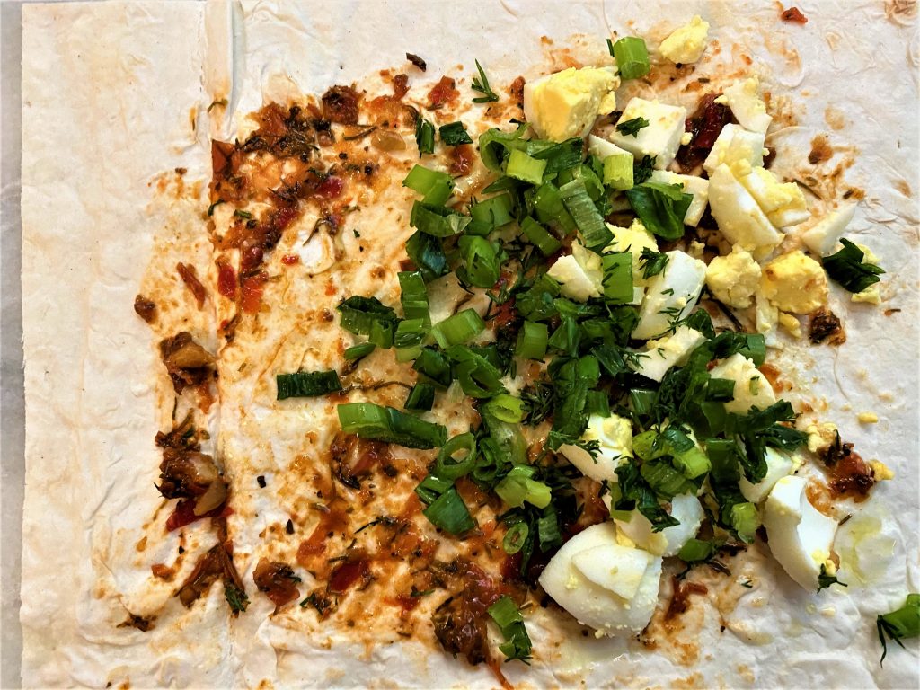 adjika quail eggs onion and dill on lavash 2