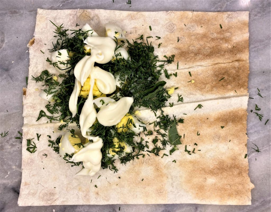 quail eggs with mayo and dill in lavash