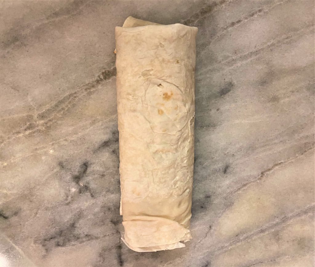 walnut and garlic with spices and salt in a lavash wrap ready